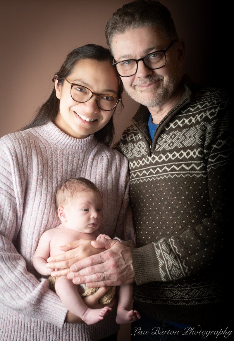 Baby Sebastian with parents born through Manchester Fertility