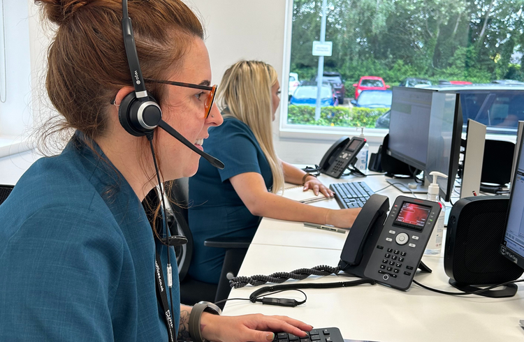 Manchester fertility's new patient team talking on the phone