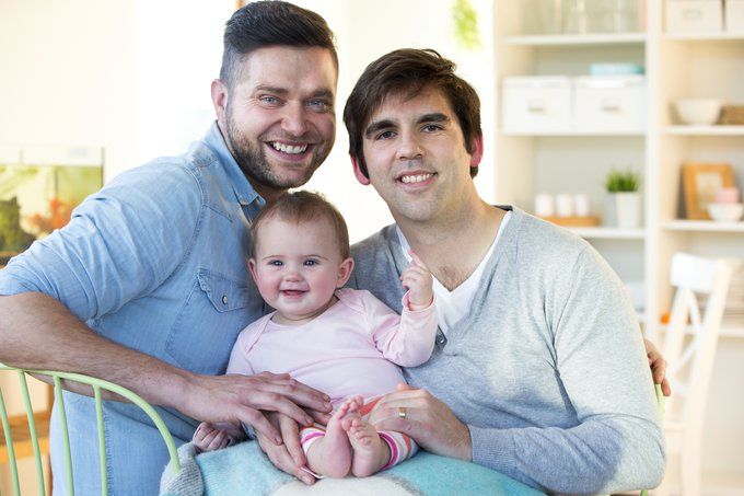 gay male couple with baby
