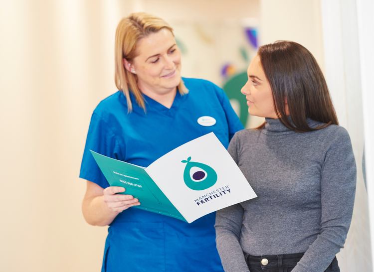 One of the Manchester Fertility team members talking to a patient about her support options
