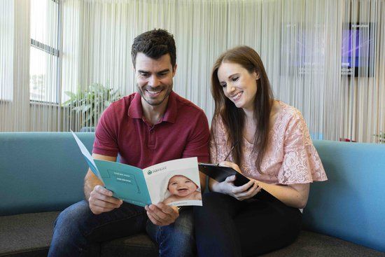 a couple choosing an IVF clinic