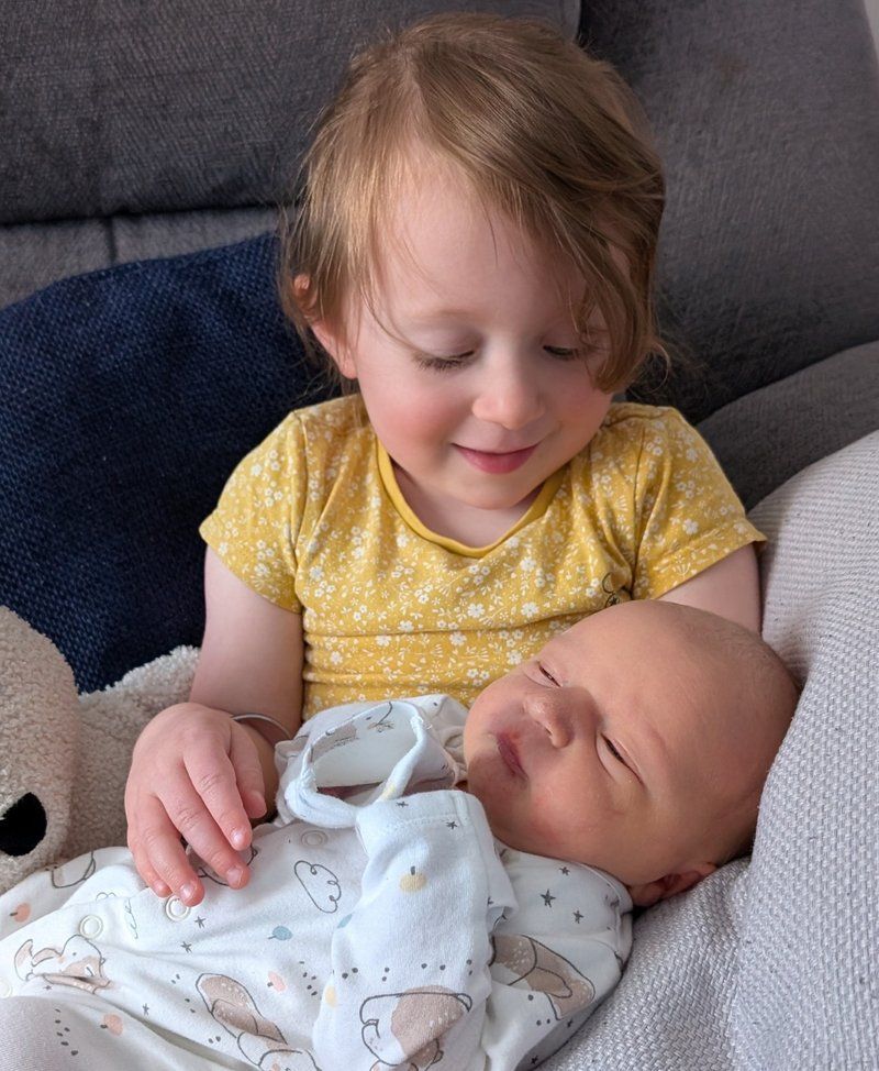 Baby Rupert with big sister Phoebe