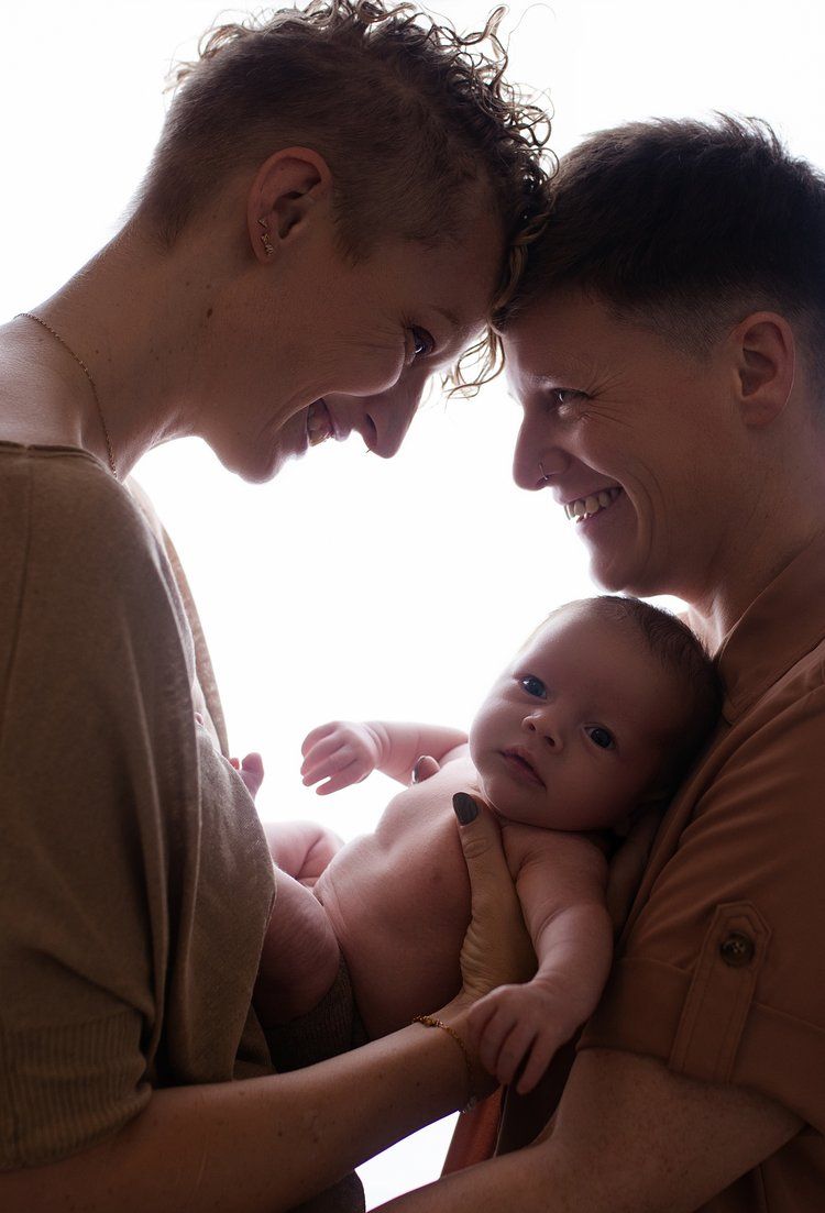 Baby Theo with parents born through Manchester Fertility