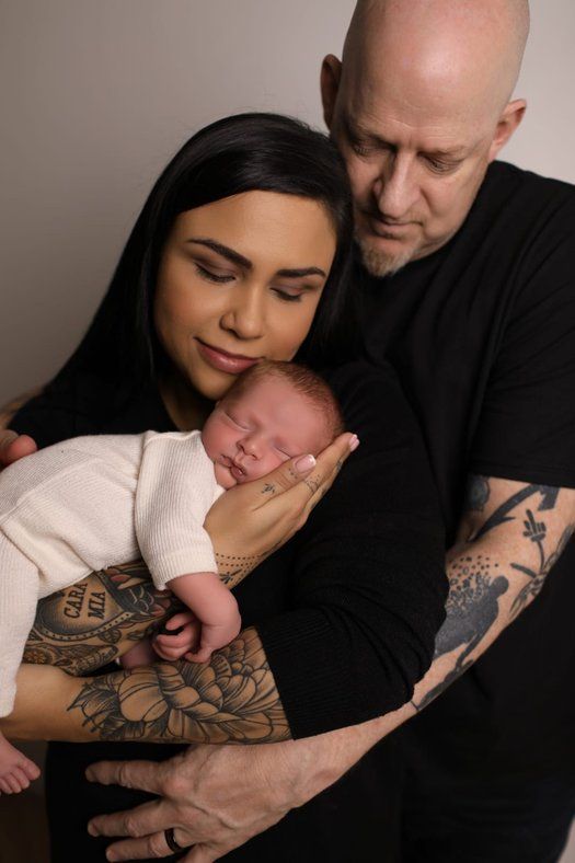 Baby Addam with parents born through Manchester Fertility