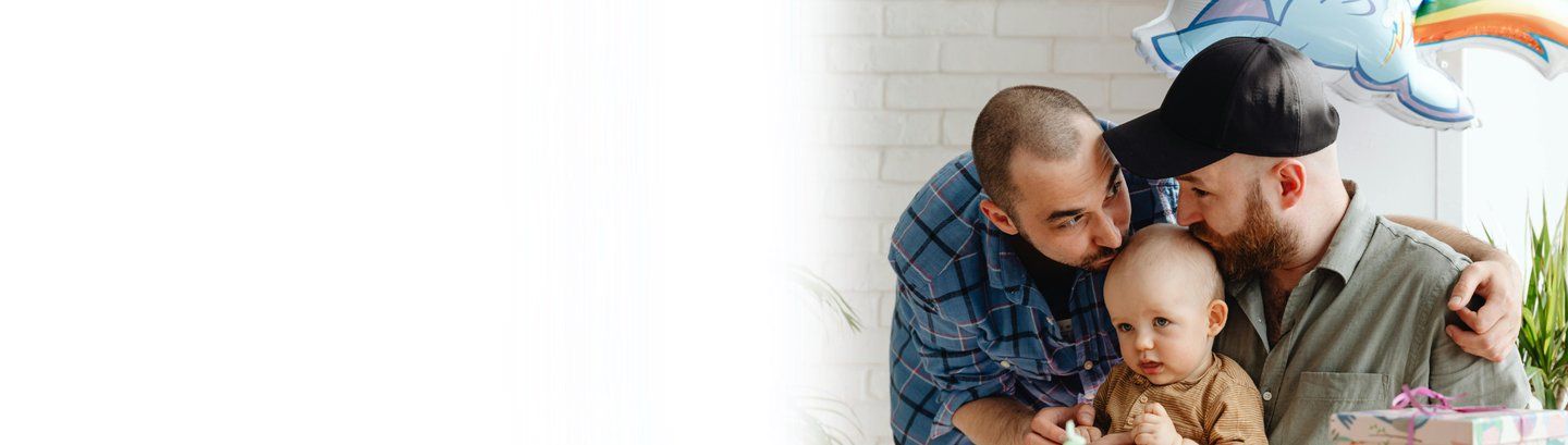 Same-sex male couple discussing surrogacy