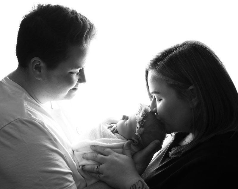 Baby Honey with parents born through Manchester Fertility