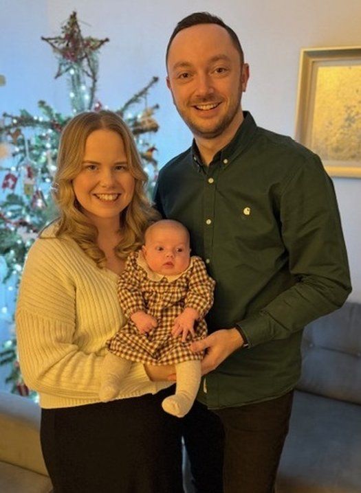 Baby Erin with parents born through Manchester Fertility