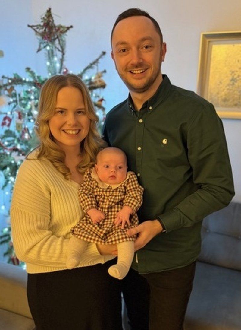 Baby Erin with parents born through Manchester Fertility