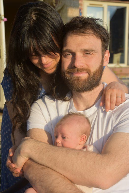Baby Aurora with parents