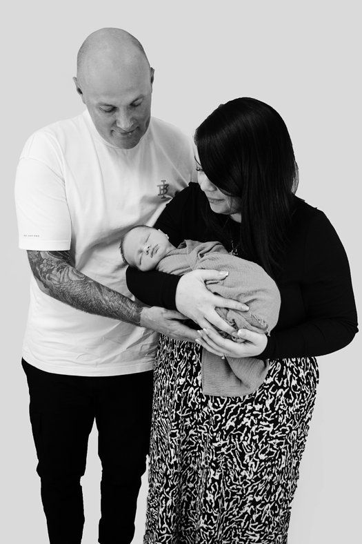 Baby Raea with parents born through Manchester Fertility