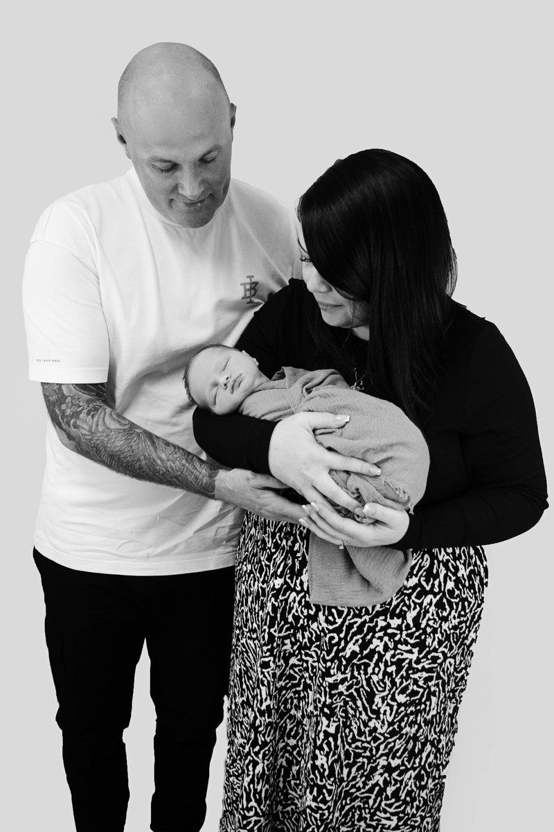 Baby Raea with parents born through Manchester Fertility